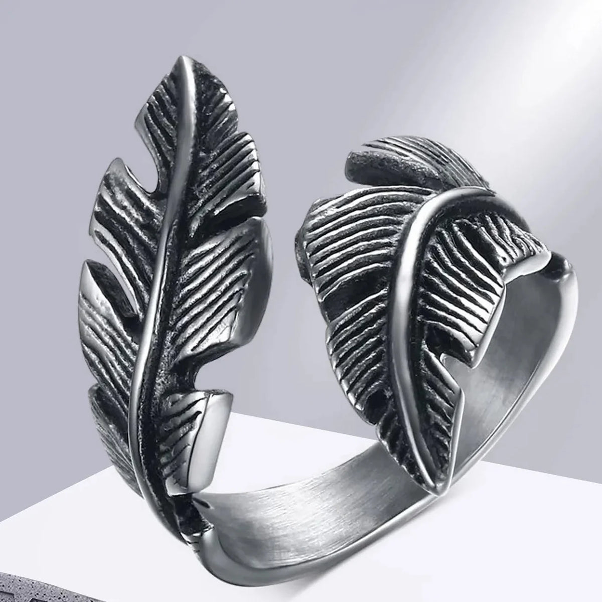 Bague ajustable plume argentée