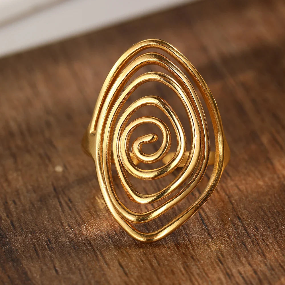 Bague large en forme de spirale texturée or