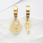 Boucles d'oreilles créoles clef et cadenas or