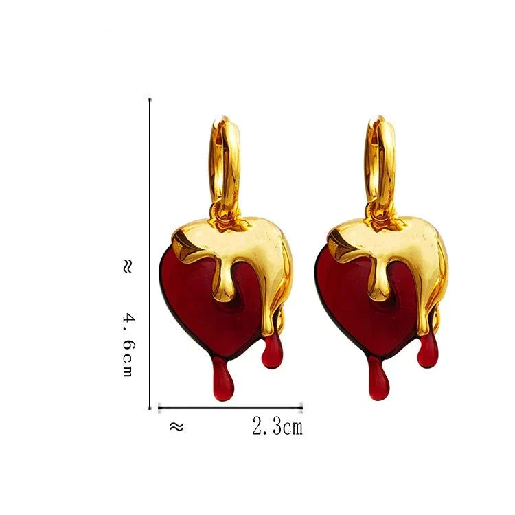 ハートモチーフの溶けたようなゴールドフープピアス