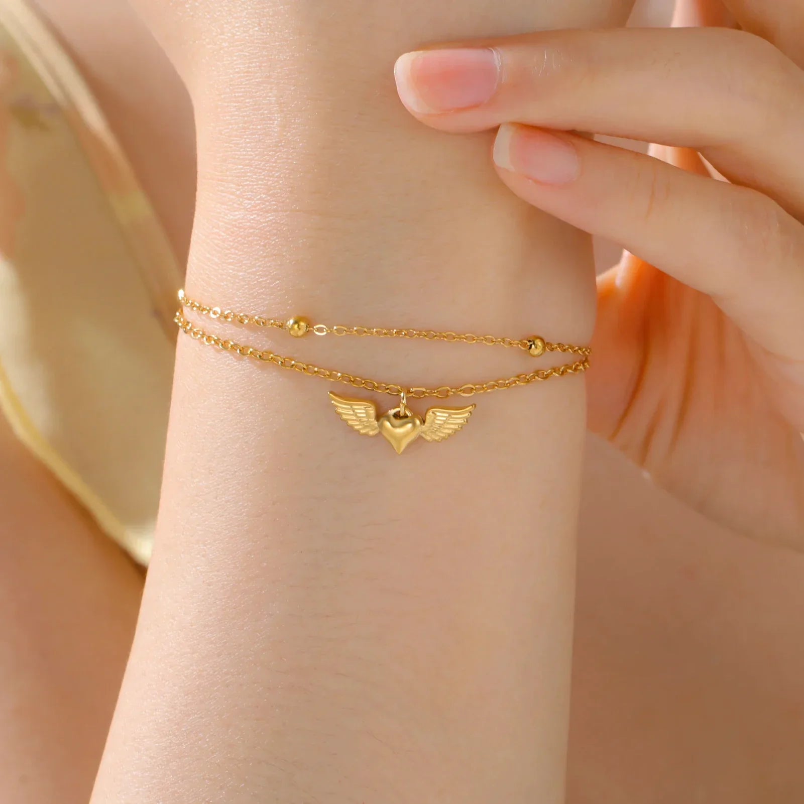 Bracelet ajustable ailes d'ange or