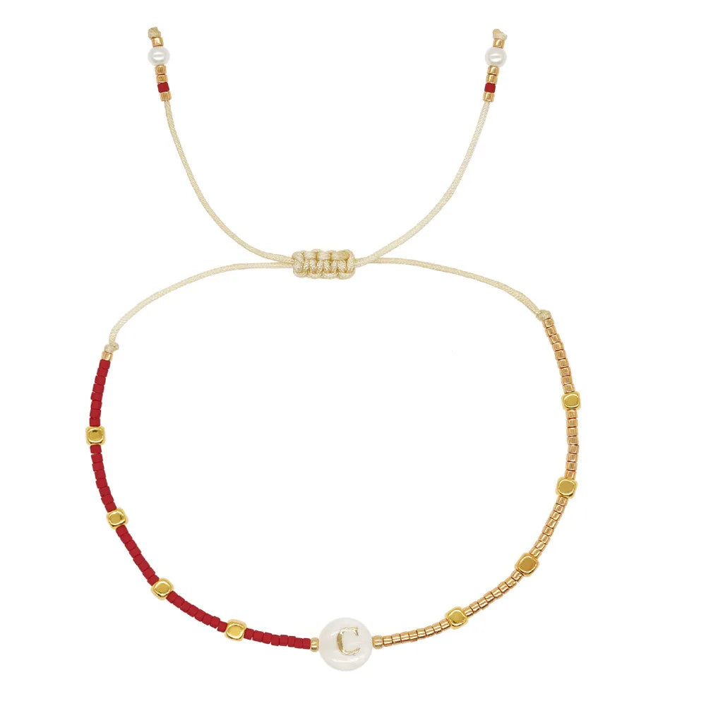 Bracelet bicolore initiale c