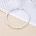 Bracelet blanc initiale a