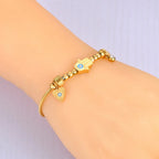 Bracelet de Protection avec Main de Fatma et Oeil Bleu or