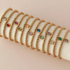 Bracelet doré avec pierre de naissance pour femme janvier