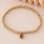 Bracelet doré avec pierre de naissance pour femme