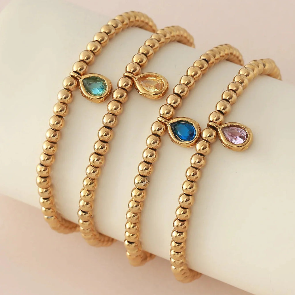 Bracelet doré avec pierre de naissance pour femme