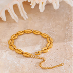Bracelet doré coquillage cauri