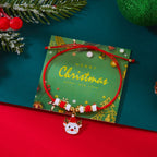 クリスマストナカイモチーフのレッドペンダント付きコードブレスレット