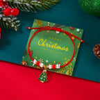 クリスマスツリーとボールモチーフのレッドペンダント付きコードブレスレット