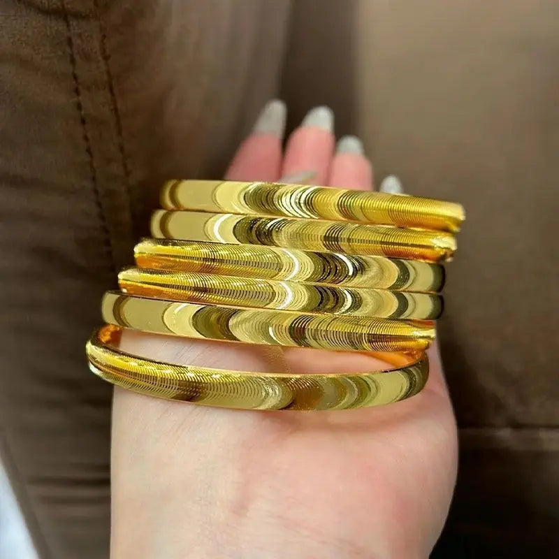 ポリッシュ仕上げのキャッツアイストーン ブレスレット 