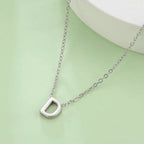 Collier avec pendentif initiale - lettre