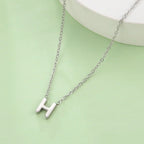 Collier avec pendentif initiale - lettre