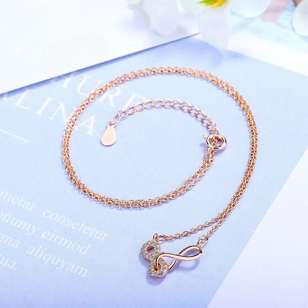 Collier Double Pendentif Infini et Zircon or rose