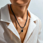Collier Pendentif en Perles Noires pour Homme