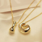 Collier femme avec pendentif initiale g