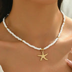 Collier ras du cou coquillage et étoile de mer blanc fines perles