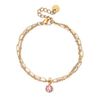 Double bracelet doré avec pierre de naissance