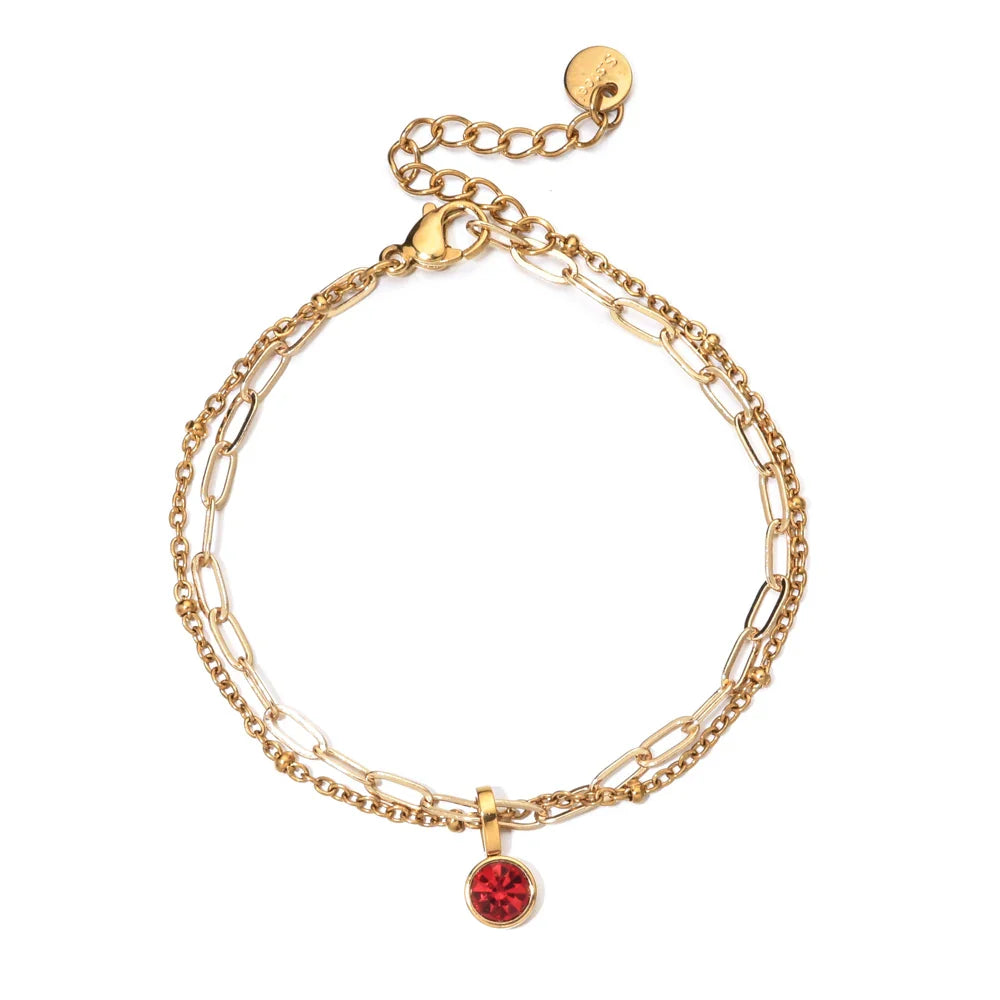 Double bracelet doré avec pierre de naissance