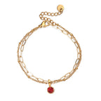 Double bracelet doré avec pierre de naissance