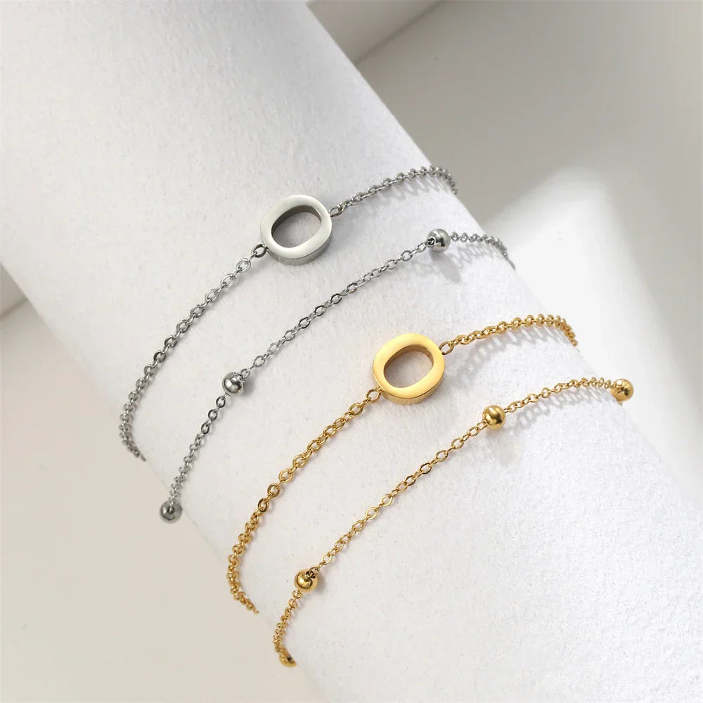 Bracelet double initiale or et argent  o