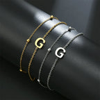 Bracelet double initiale or et argent  g